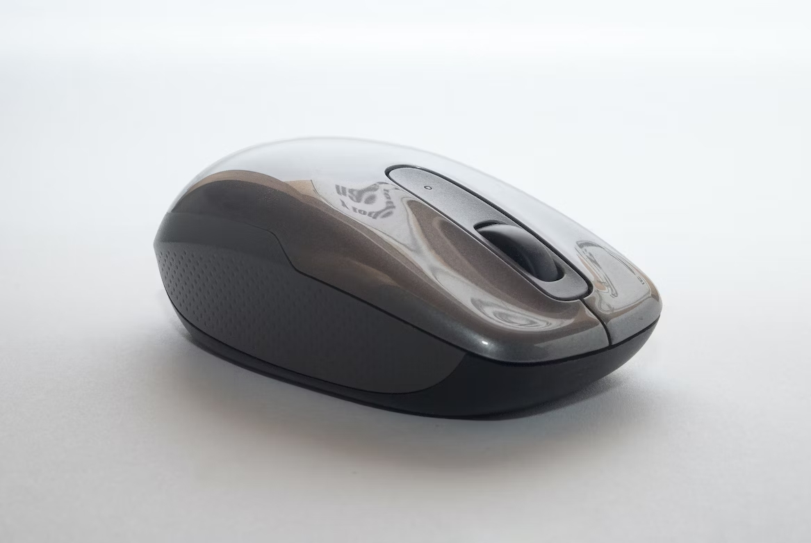 Computer mouse in grey tones
